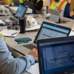 construction workers in meeting