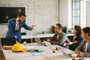 Business meeting of individuals at a conference table